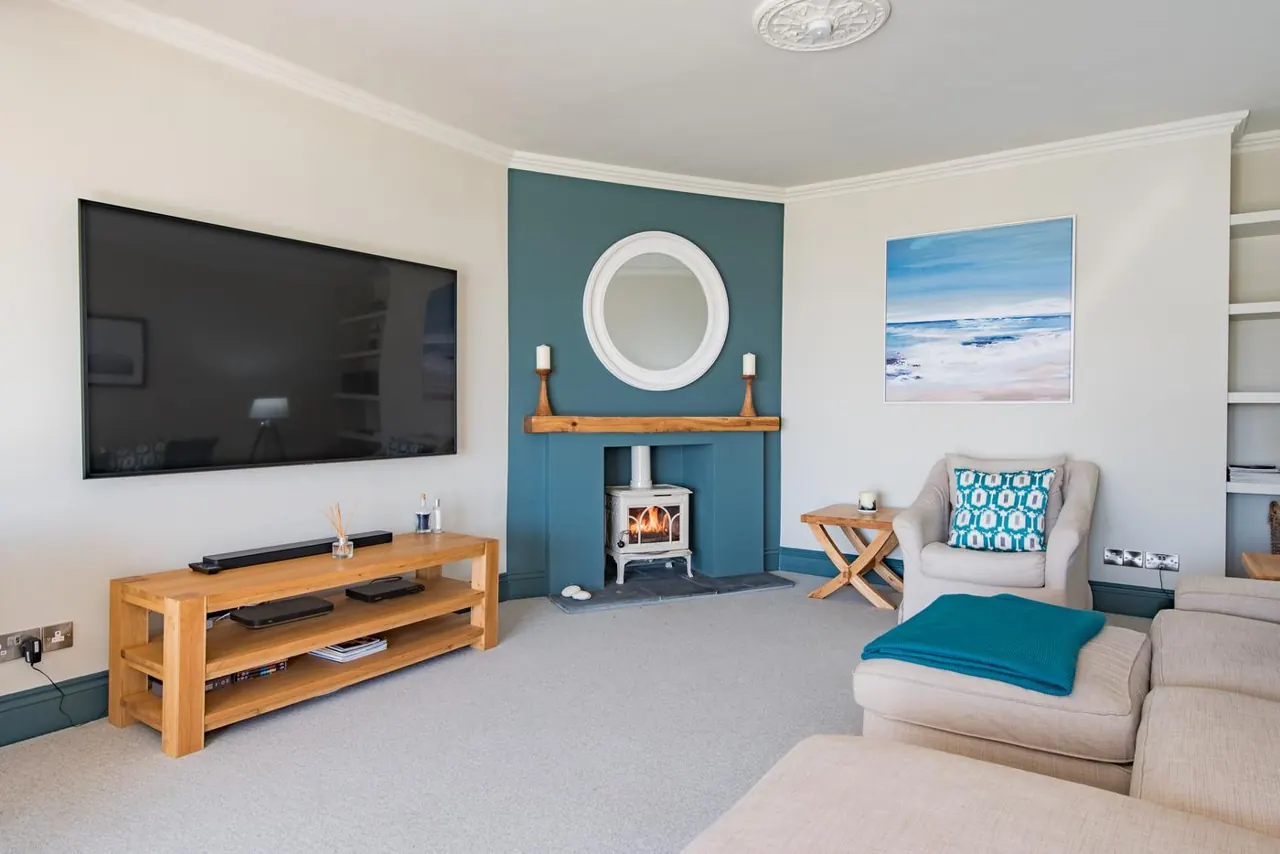 The lounge with its wood burner